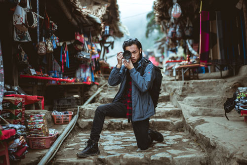 Quốc Huy đam mê chụp ảnh và làm phim để lưu giữ các kỷ niệm đẹp cho mọi người. Ảnh: NVCC.