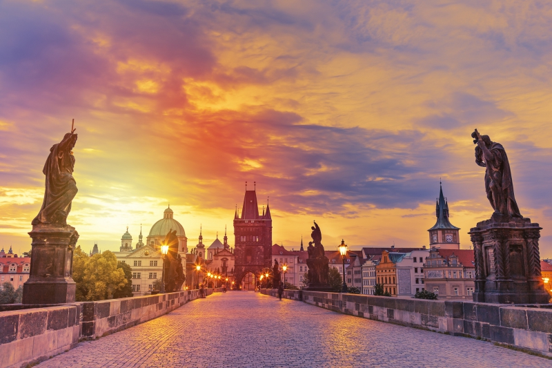 View of Charles Bridge in Prague during sunset, Czech Republic. The world famous Prague landmark.